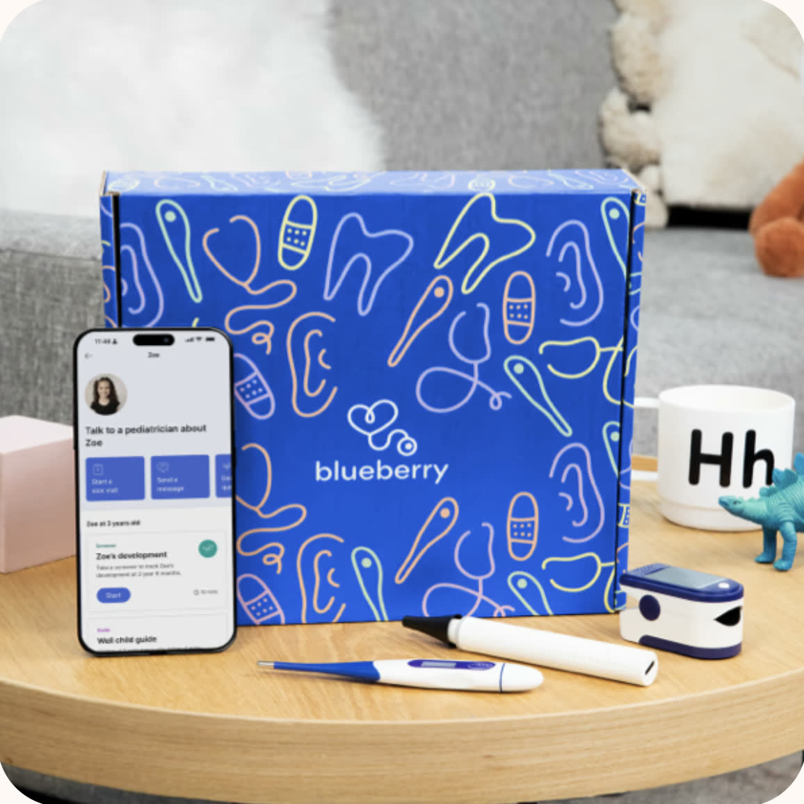 The Blueberry at-home medical kit box with a smart earscope, pulse oximeter, and oral thermometer