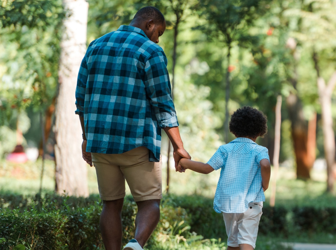 Father walking with child
